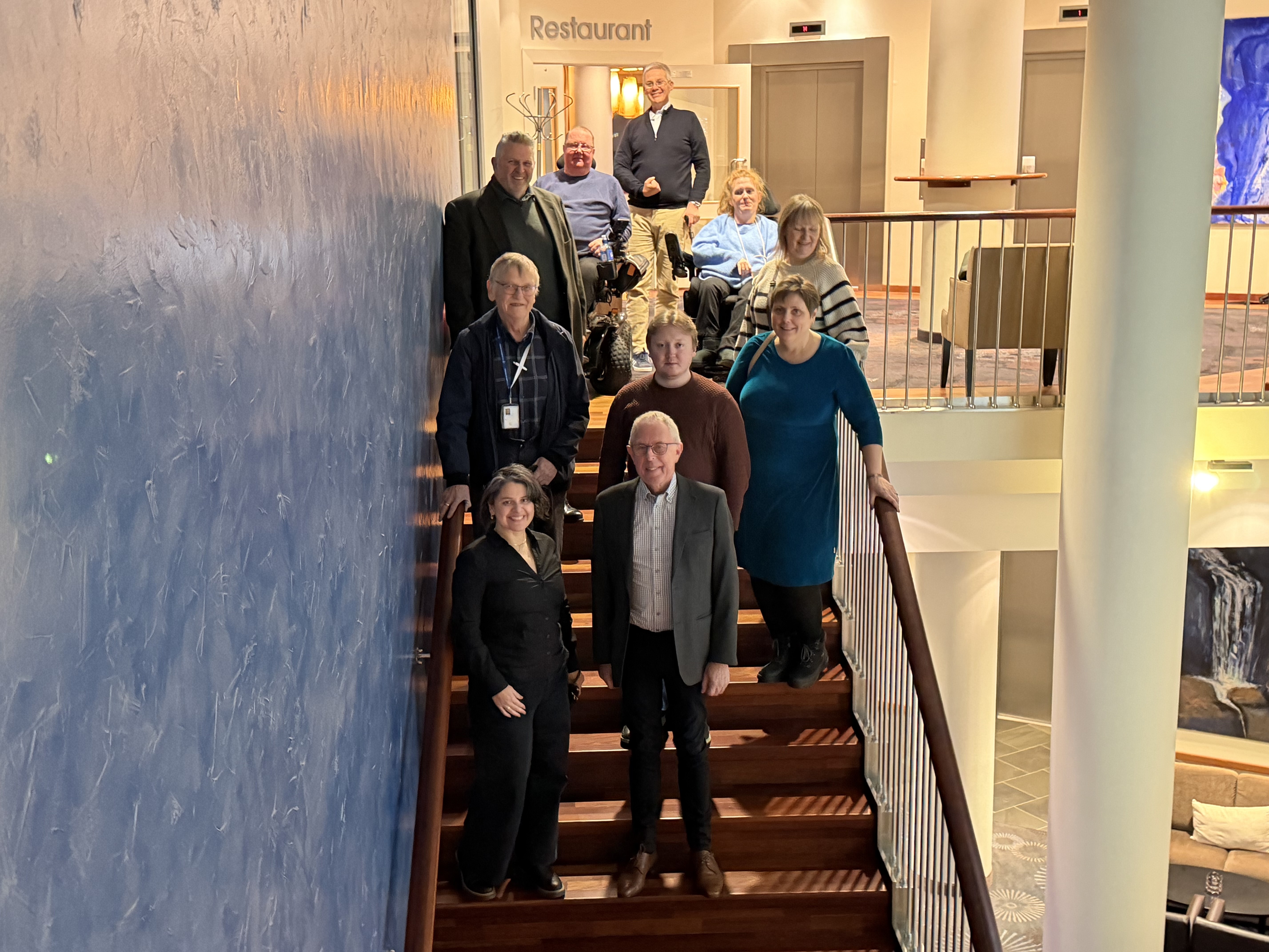 10 medlemmar av brukarutvalet i HMR står oppstilt for fotografering.