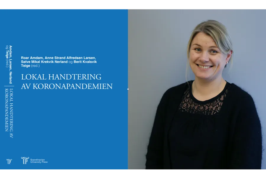 En kvinne som smiler til kameraet
