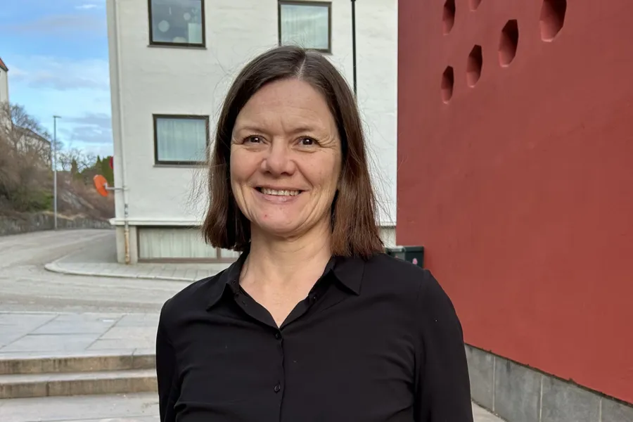 En person som smiler for kameraet