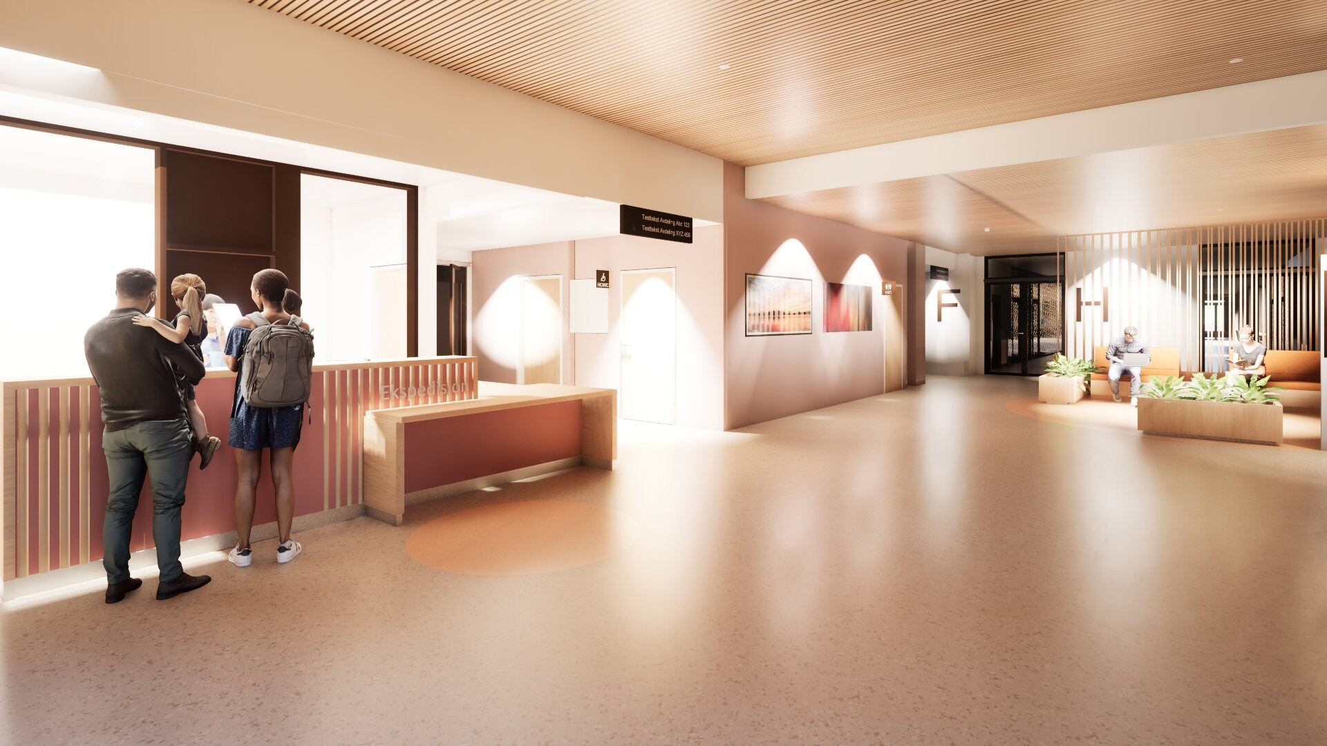 Et par personer som står i et stort rom med et stort vindu