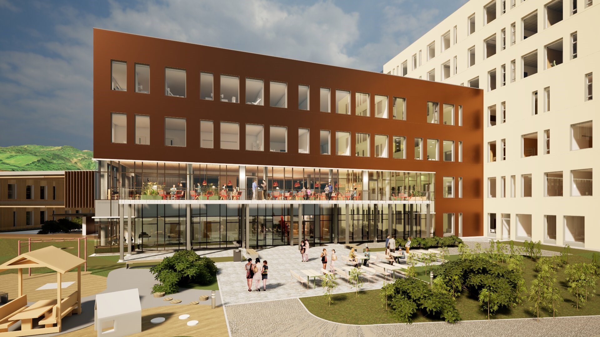 En bygning med gårdsplass og folk som går rundt