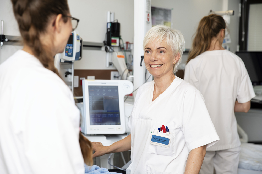 A person in a white coat