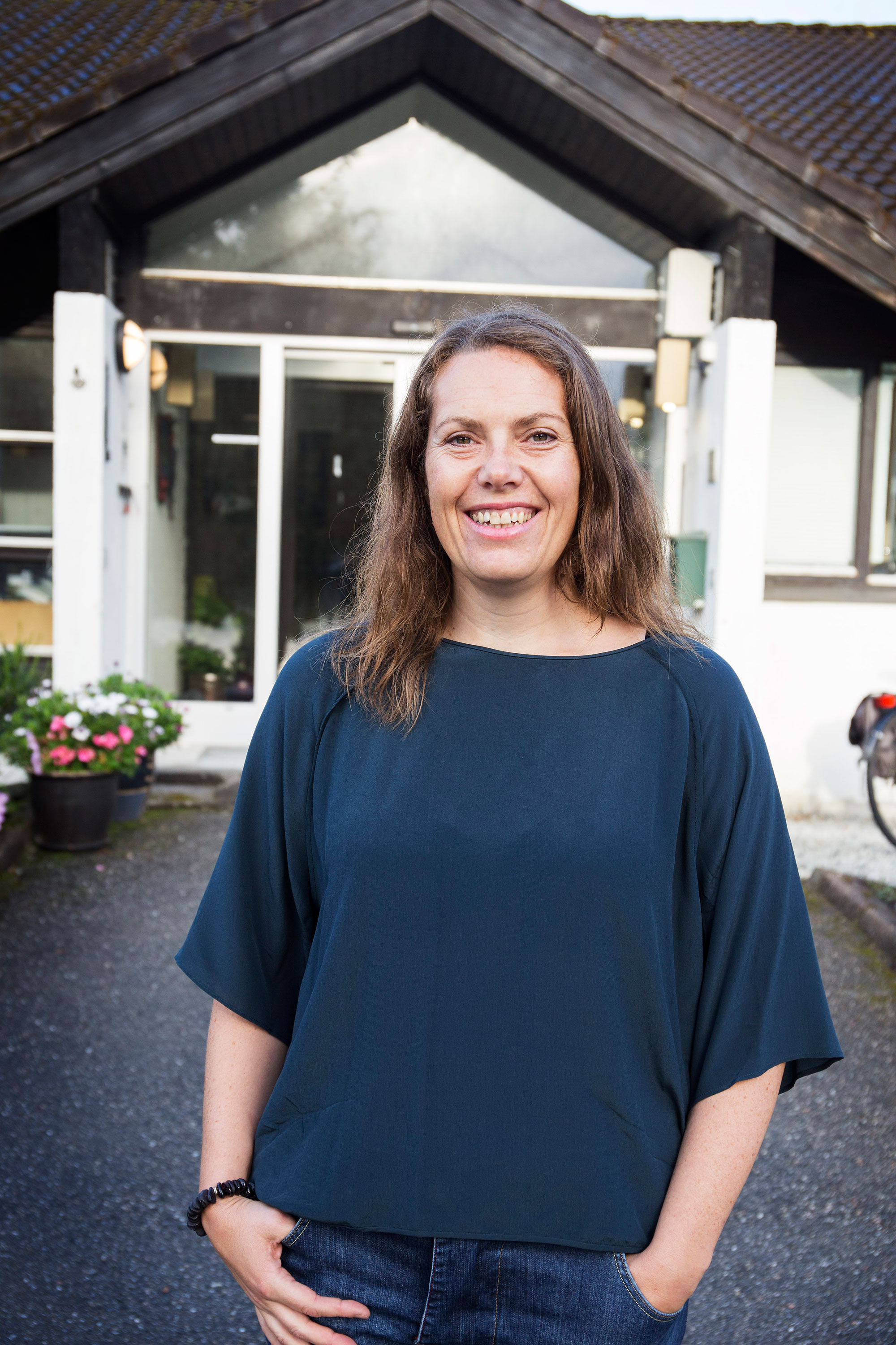 En person som smiler for kameraet