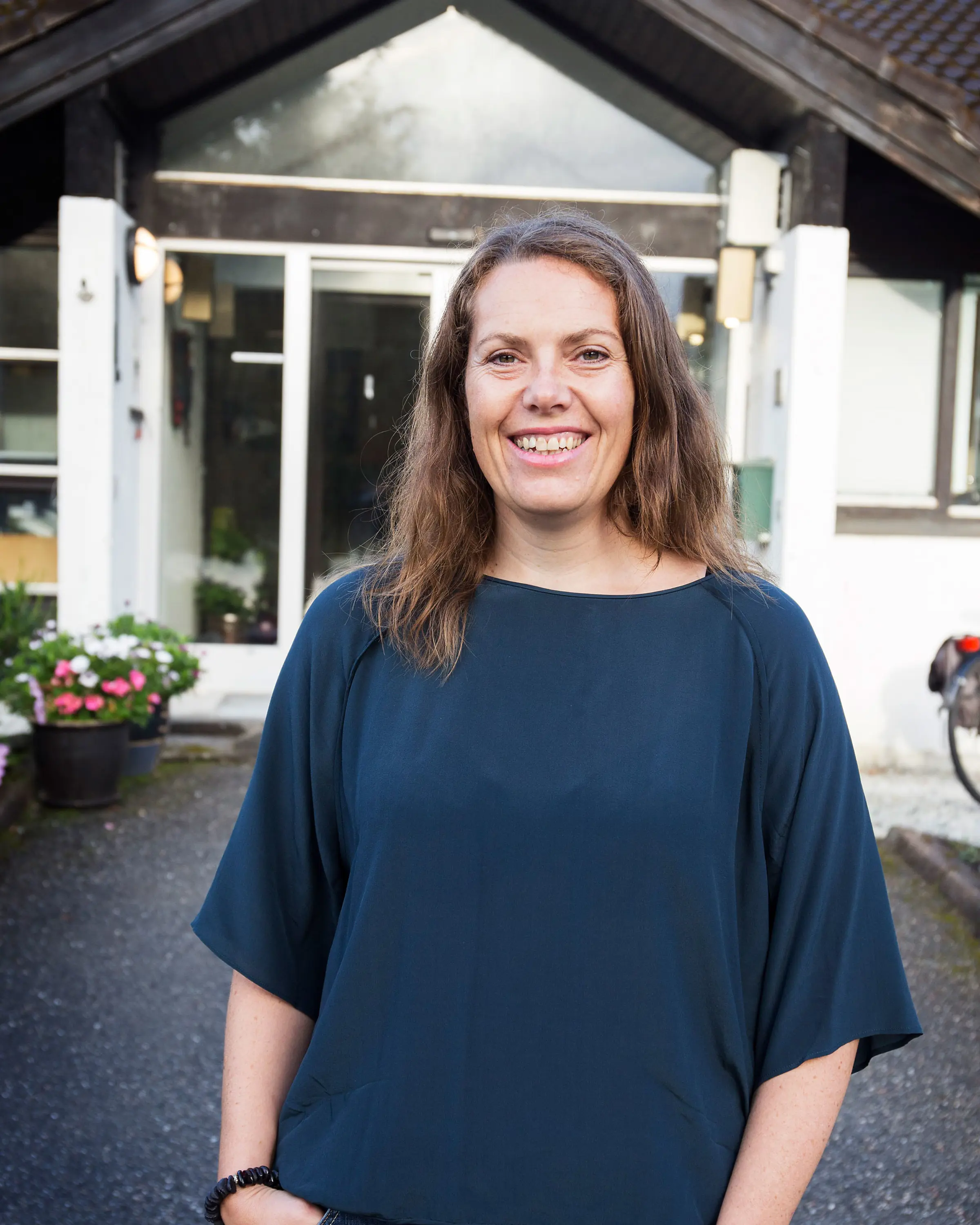 En person som smiler for kameraet