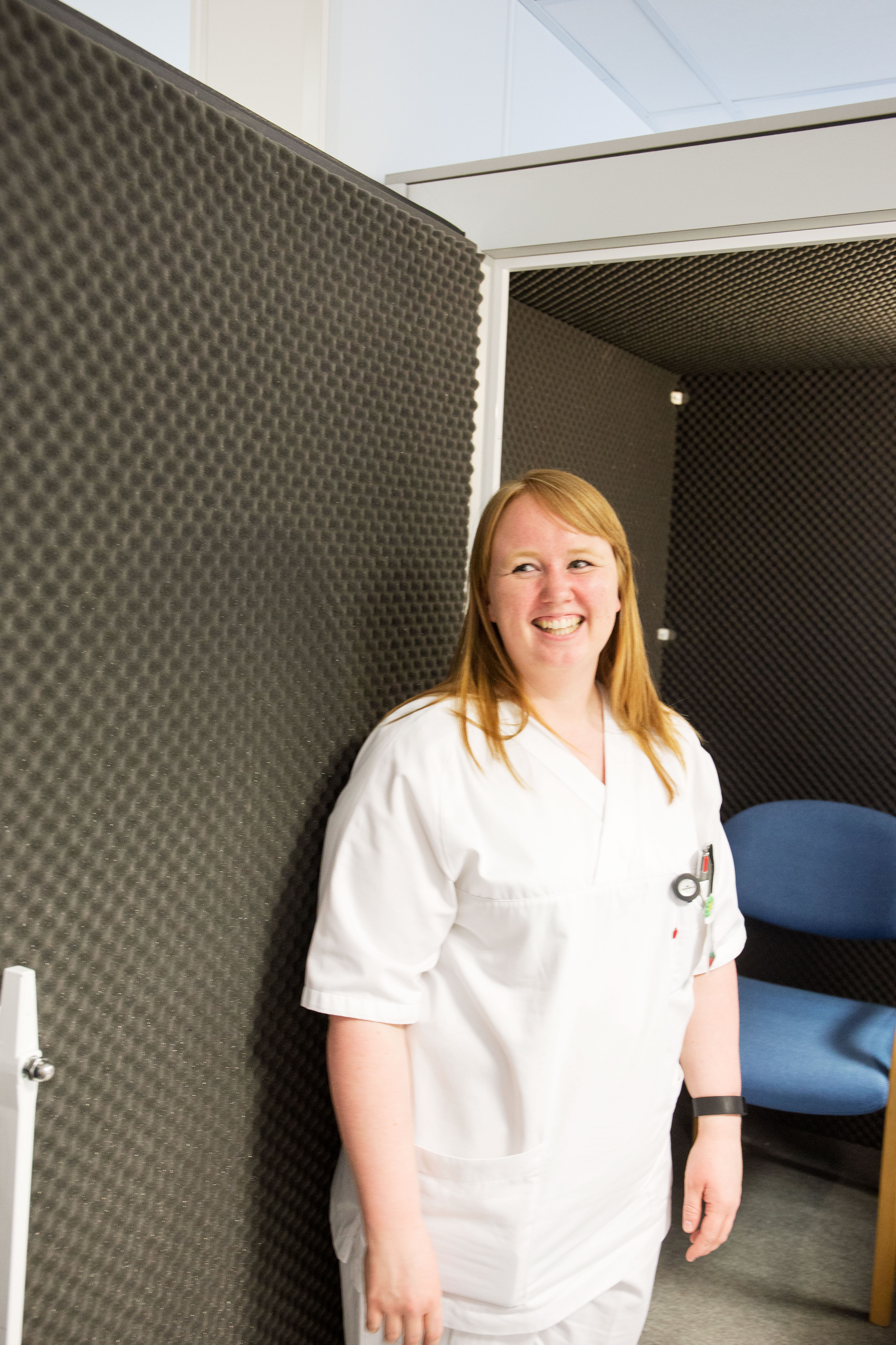 En person som smiler for kameraet