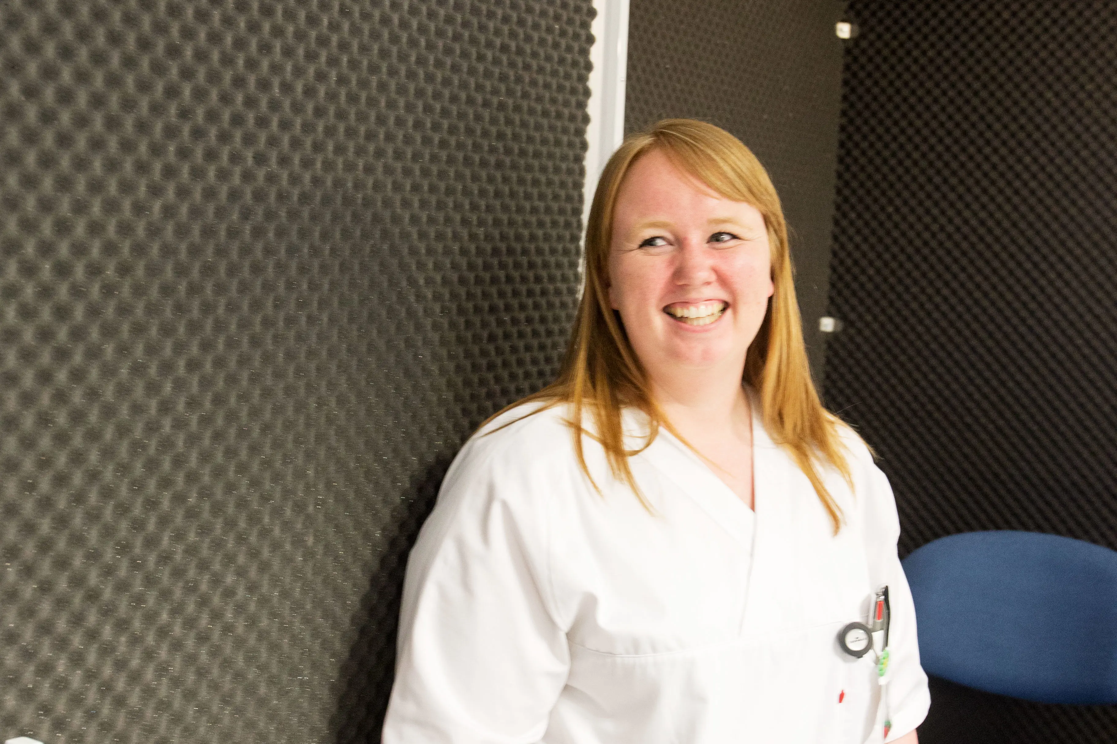 En person som smiler for kameraet