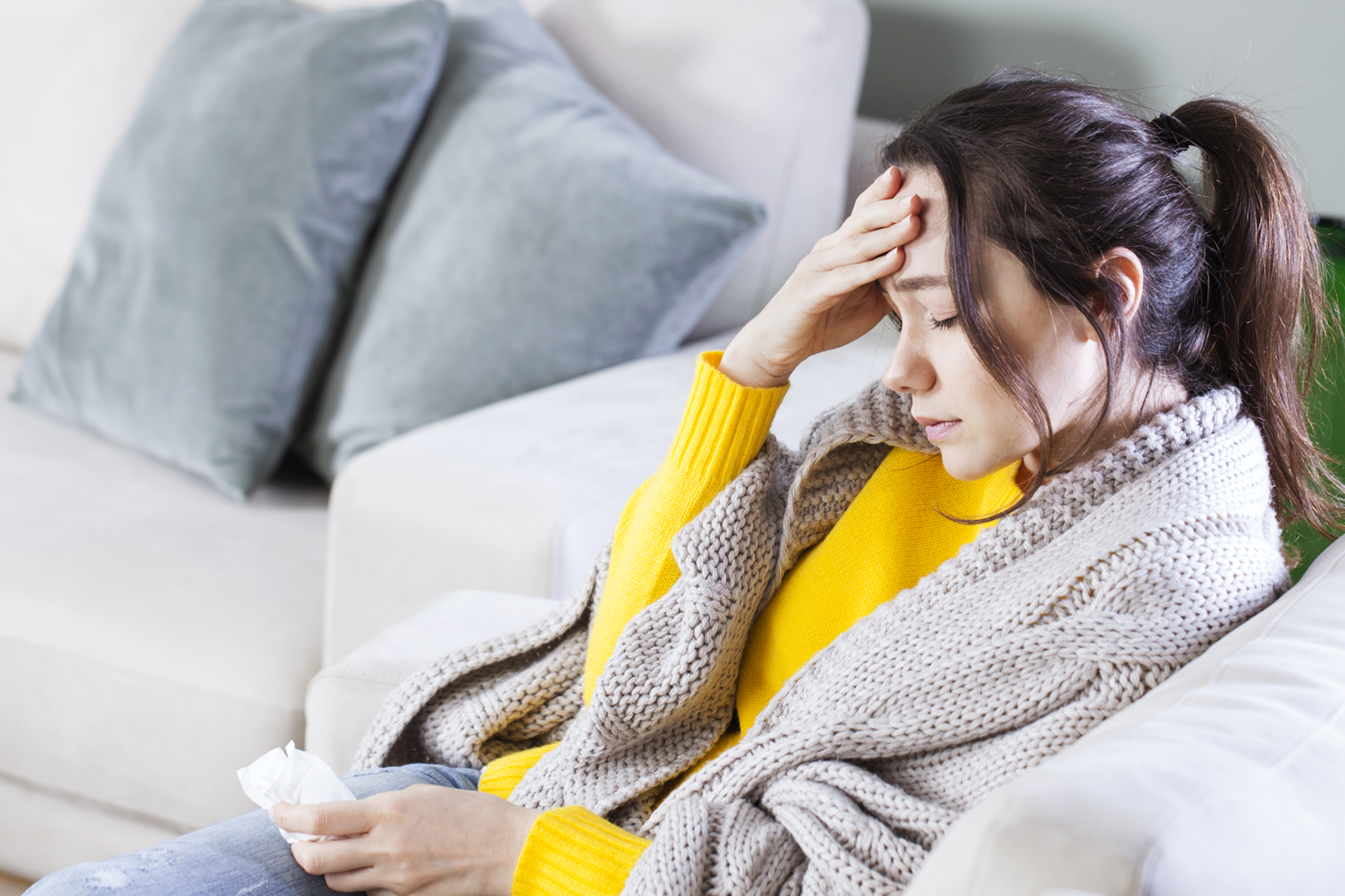 Kvinne med hodepine