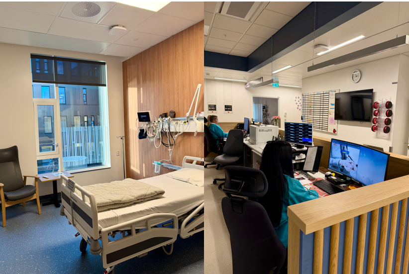 Et rom med et skrivebord og en person som sitter ved et skrivebord