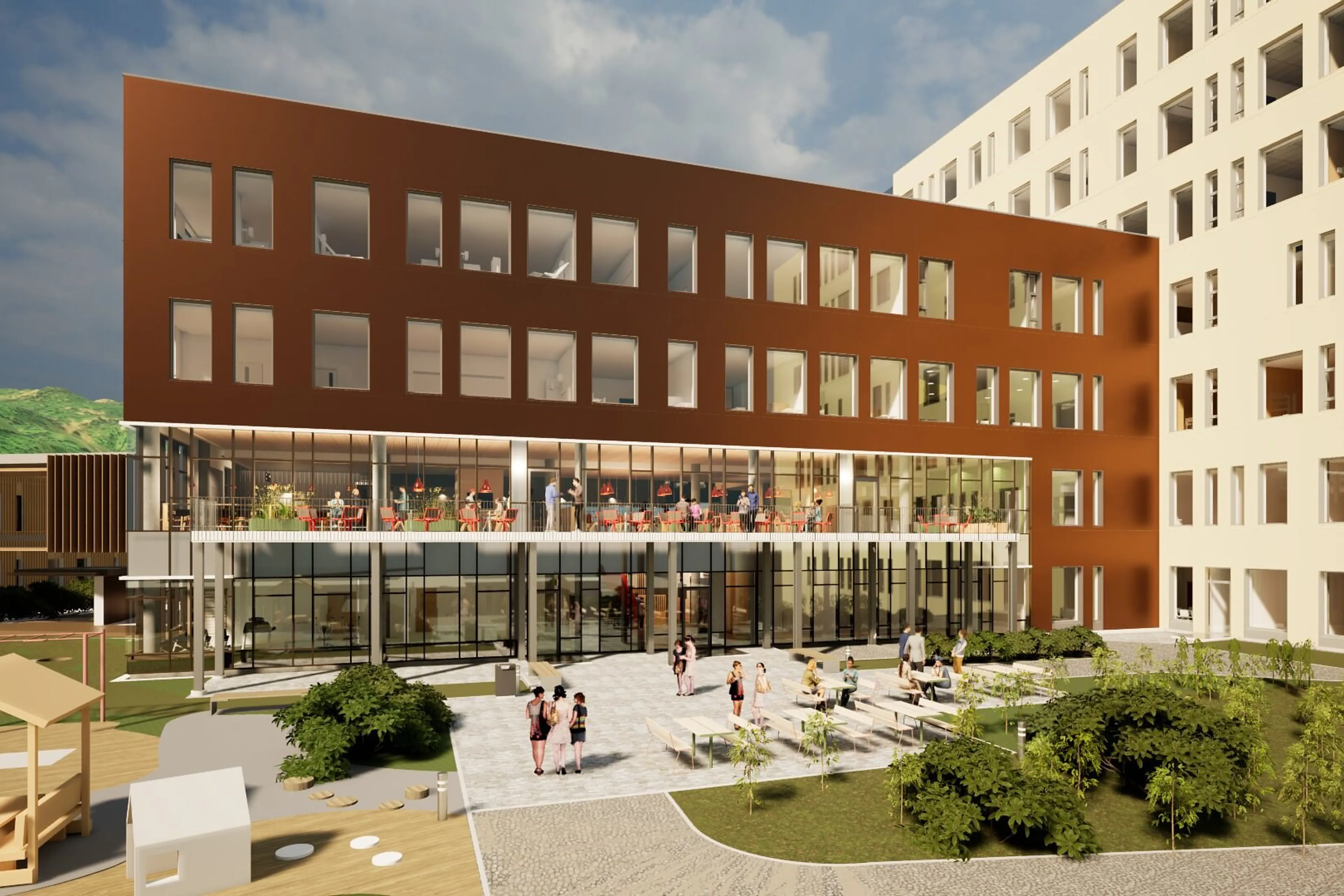 En bygning med gårdsplass og folk som går rundt