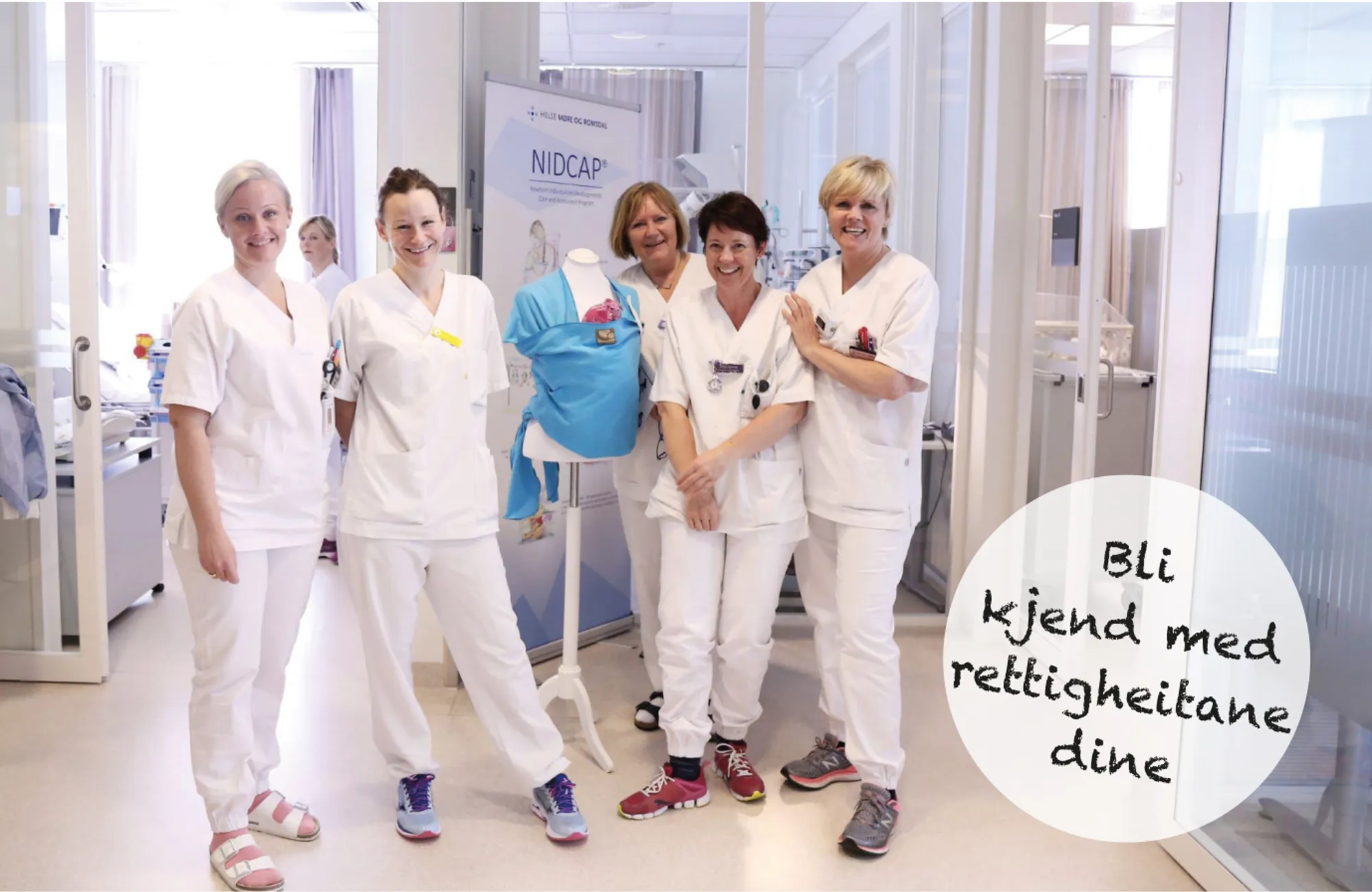 En gruppe mennesker i hvite labfrakker